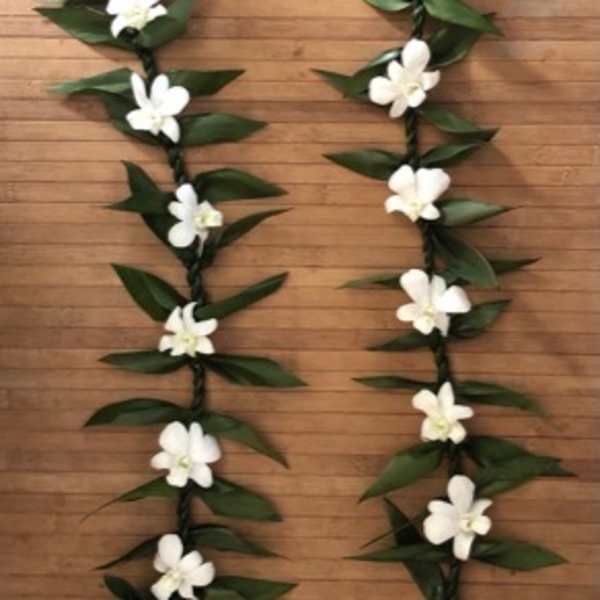 Double Ti leaf lei with orchid blooms