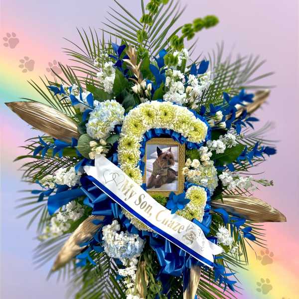 Blue and white funeral wreath with a pet photo and ribbon
