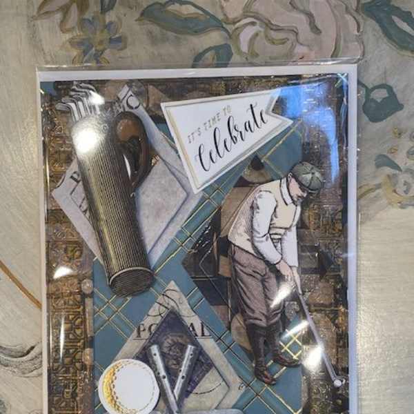 Decorative card with golf-themed cutouts and a "It's time to celebrate" sign