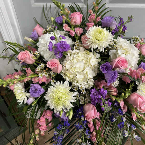 Large bouquet of pink, white, and purple flowers with chrysanthemums and roses