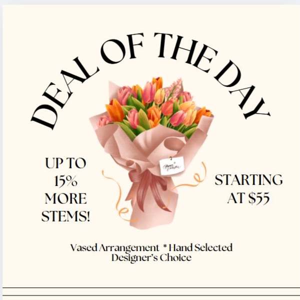 Bouquet of multicolored tulips wrapped in pink paper