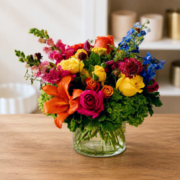 Colorful mixed bouquet in a clear glass vase
