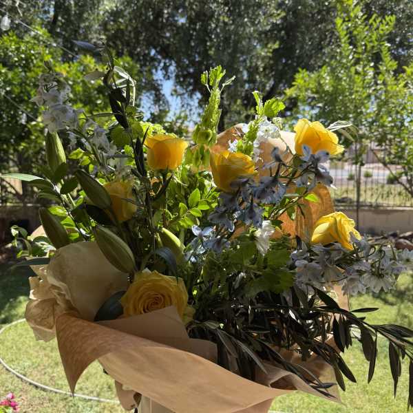 Yellow rose wrapped bouquet