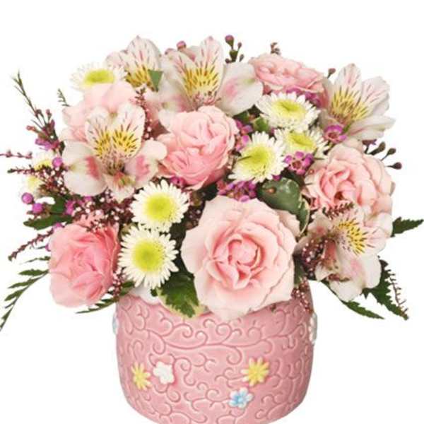 Pink roses and white alstroemeria in a pink decorative pot