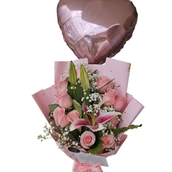 Pink rose bouquet with lilies and a heart-shaped balloon