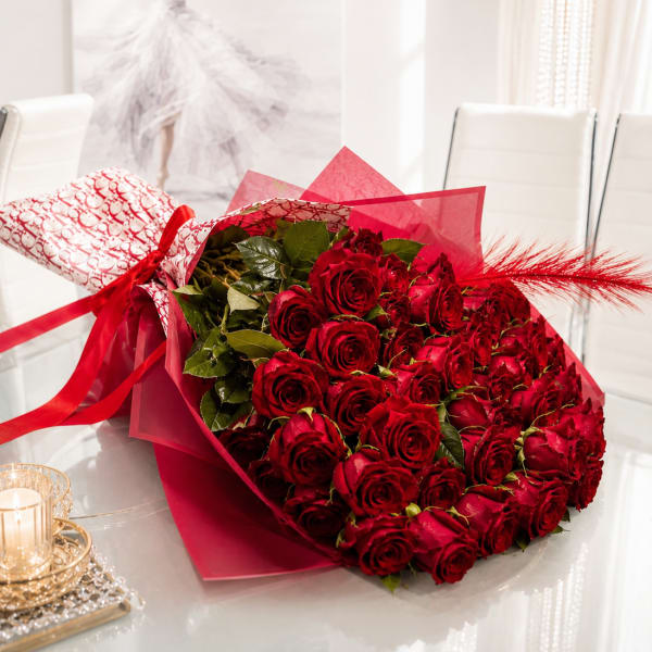 50 Red Wrapped Roses
