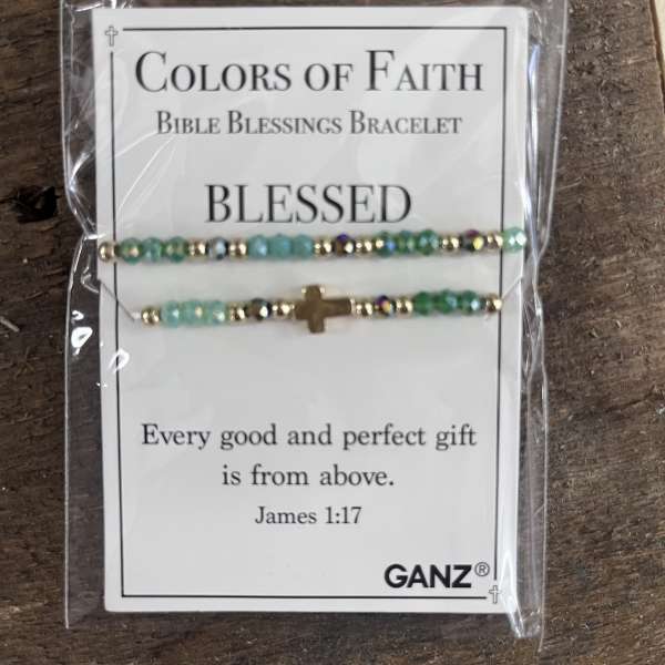 Packaged beaded bracelet set with a small cross charm