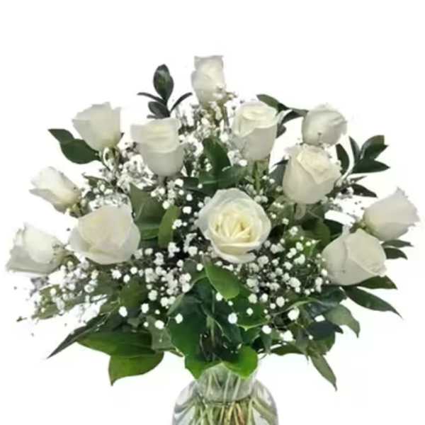 White rose bouquet in a clear glass vase