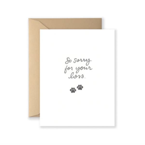 Sympathy card reading "So sorry for your loss" with paw prints