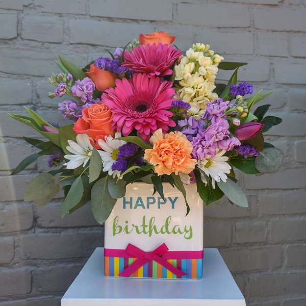 Mixed bouquet in a birthday gift box with roses, gerbera daisies, and carnations