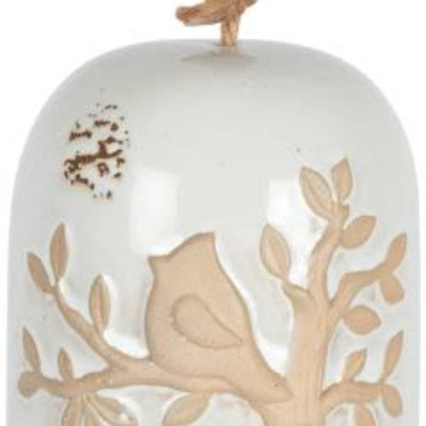 Ceramic bell ornament with a tree and bird design