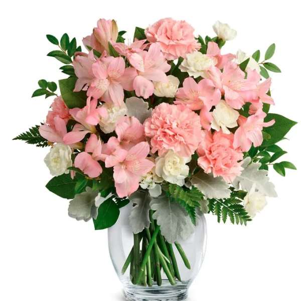 Pink and white mixed bouquet in a clear glass vase