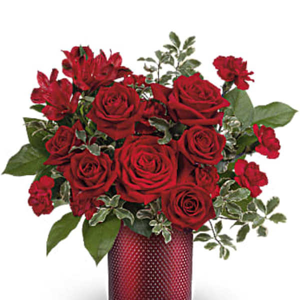 Red roses and alstroemeria in a red textured vase