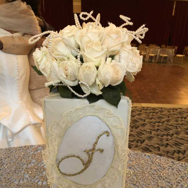 White rose arrangement in a decorated square box with pearl accents