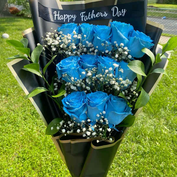 Blue rose bouquet with baby's breath and a Happy Fathers Day ribbon