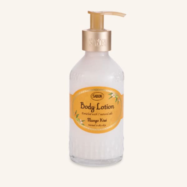 Bottle of Sabon mango kiwi body lotion with a pump dispenser