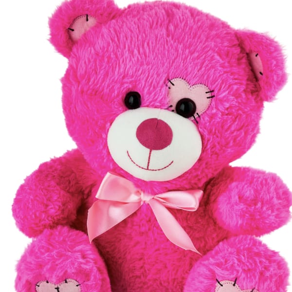 Bright pink teddy bear with a satin bow and heart patches