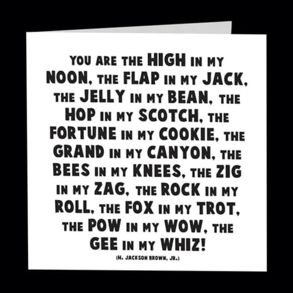 White greeting card with a bold black quote printed on the front