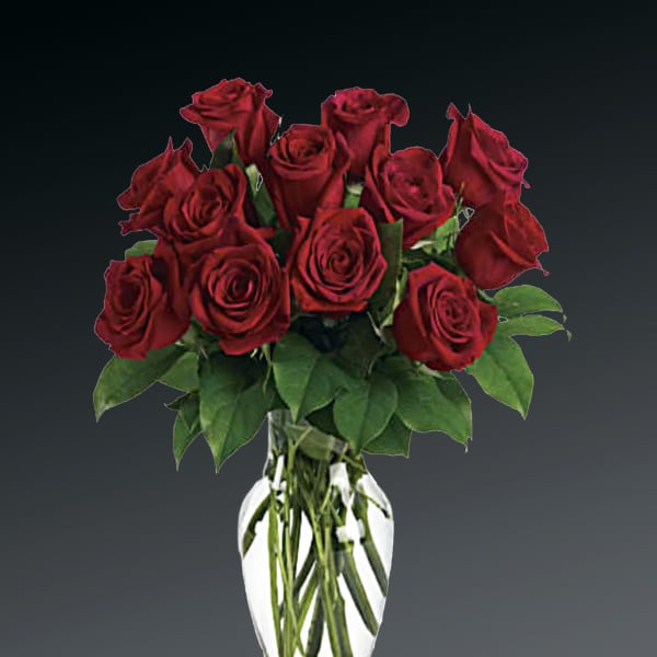 Bouquet of red roses in a clear glass vase