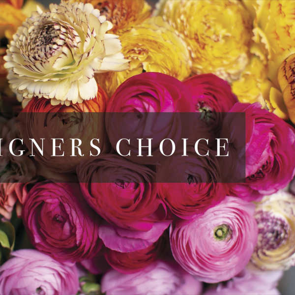 Assorted colorful flowers with a "Designers Choice" label across the center
