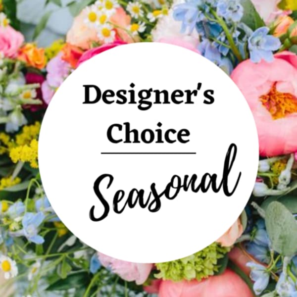 Designer’s Choice Seasonal floral arrangement with pastel blooms