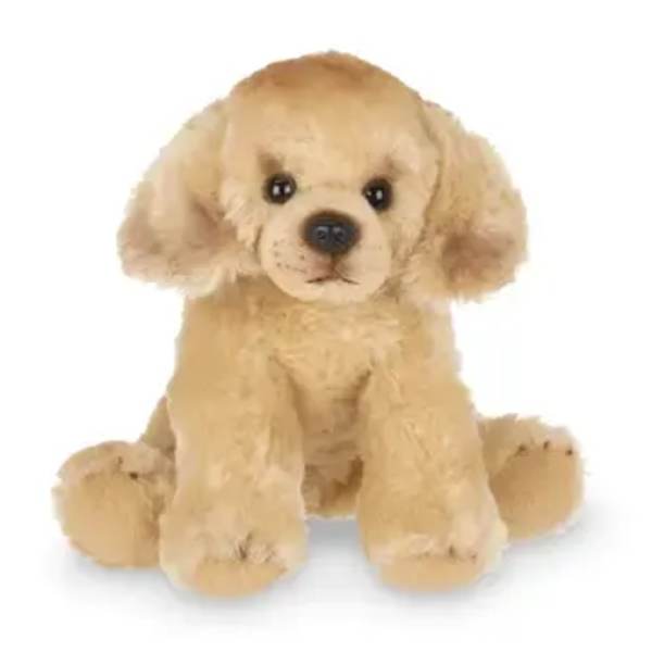 Plush tan puppy sitting on a white background