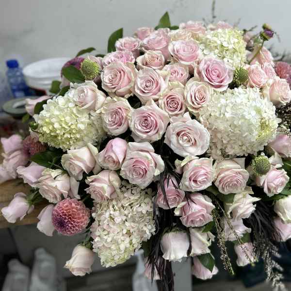 Large bouquet of pale pink roses and white hydrangeas