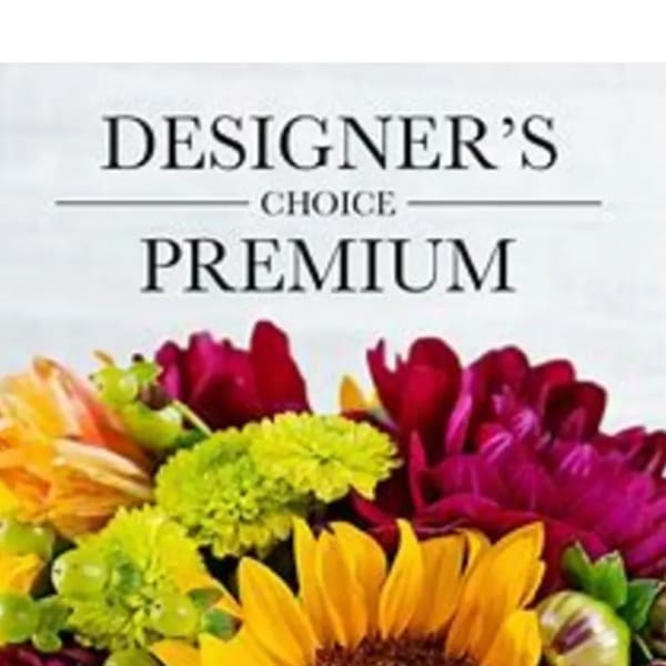Colorful mixed bouquet with yellow, red, and pink flowers