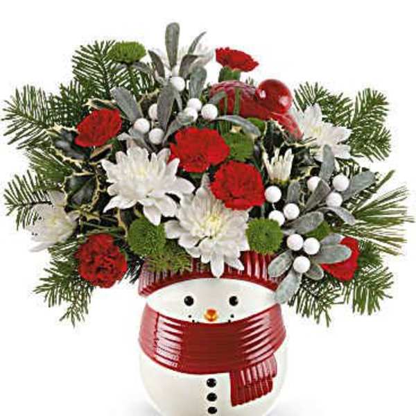 Snowman planter with red and white flowers