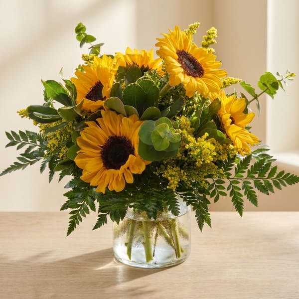 Sunflower bouquet in a clear glass vase