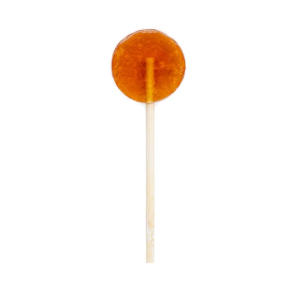 Orange round lollipop on a stick