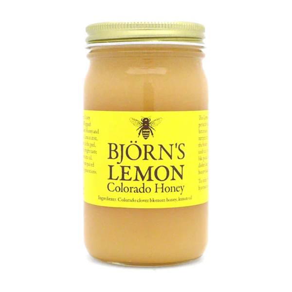 Jar of lemon honey with a yellow label