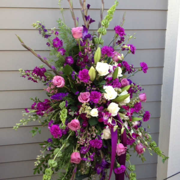 Tall floral spray with pink, white, and purple flowers