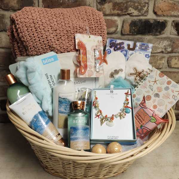 Gift basket with bath products, jewelry, and accessories