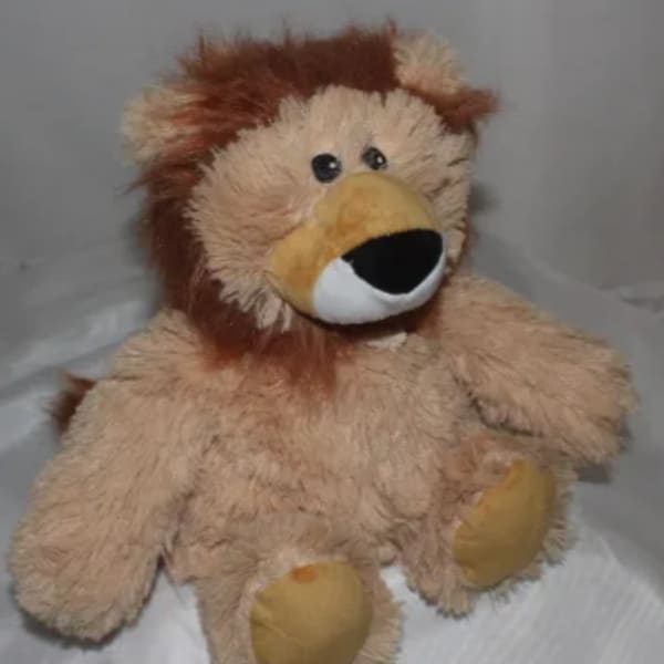 Plush lion toy with tan fur and a brown mane
