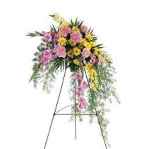 Pink and yellow floral spray on a standing easel