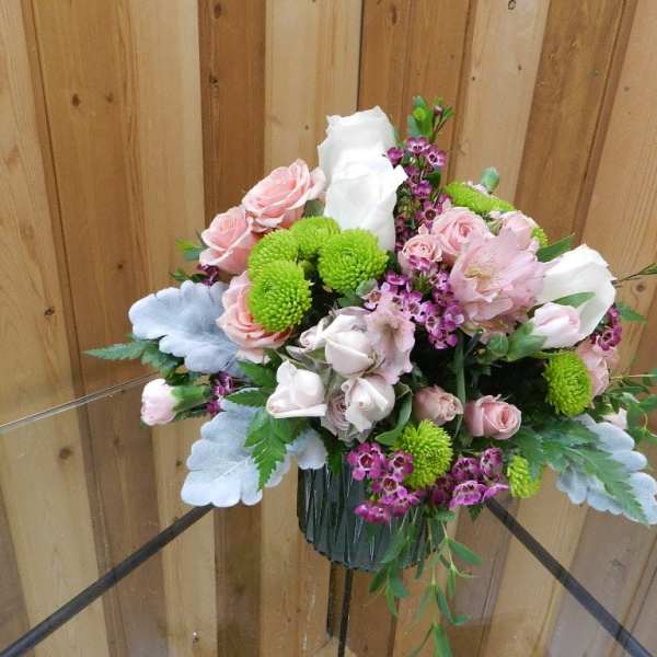 Bouquet of pink and white flowers in a glass vase