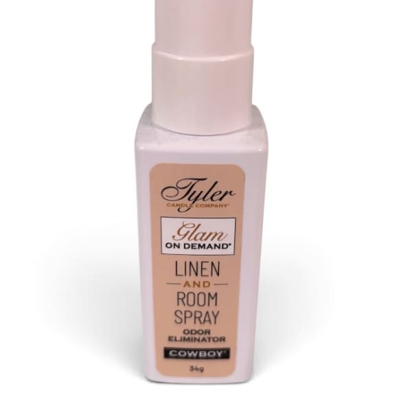 Pink room spray bottle with a labeled front