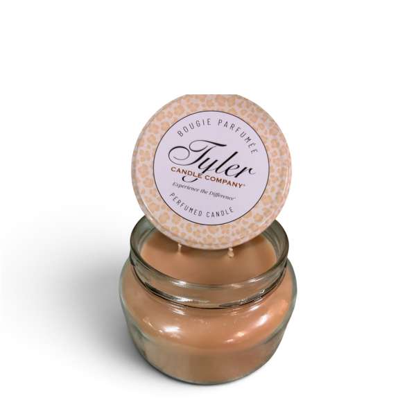 Perfumed candle in a glass jar with a printed lid