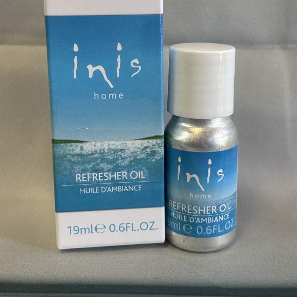 A small bottle and box of Inis home refresher oil