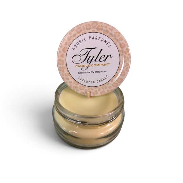Scented candle in a glass jar with a round printed lid