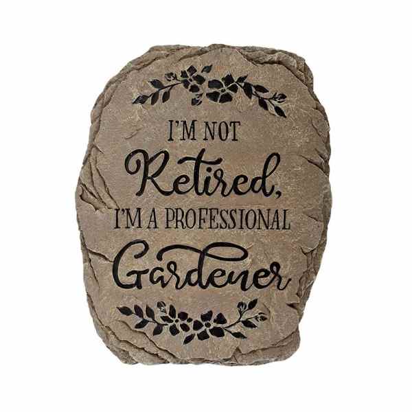 Decorative stone plaque with the words "I'm not retired, I'm a professional gardener"