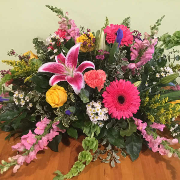 Mixed bouquet with lilies, gerbera daisies, roses, and snapdragons