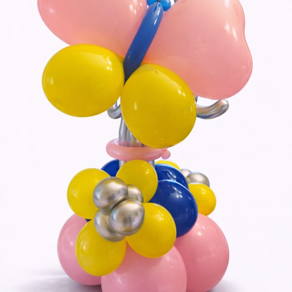 Balloon sculpture shaped like a butterfly with pink, yellow, blue, and silver balloons