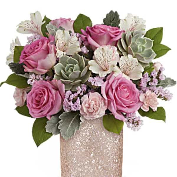 Pink roses and white alstroemeria in a glittery vase