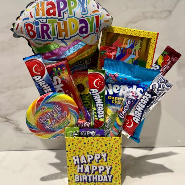 Birthday candy gift box with a balloon and assorted sweets