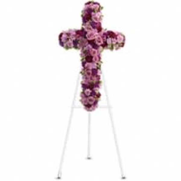 Purple floral cross on a white easel
