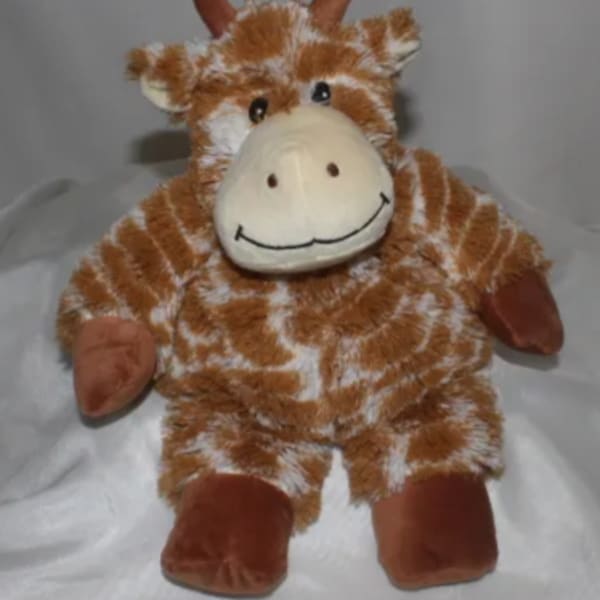 Plush giraffe toy with a smiling face and brown-and-white spotted fur