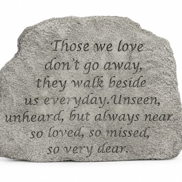 Gray memorial stone with an engraved sympathy message