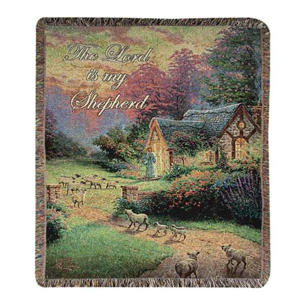Woven blanket with a pastoral scene and the text 'The Lord is my Shepherd'